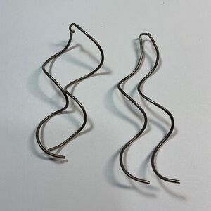 Sterling Silver twist dangle earrings. 2.5 inches long